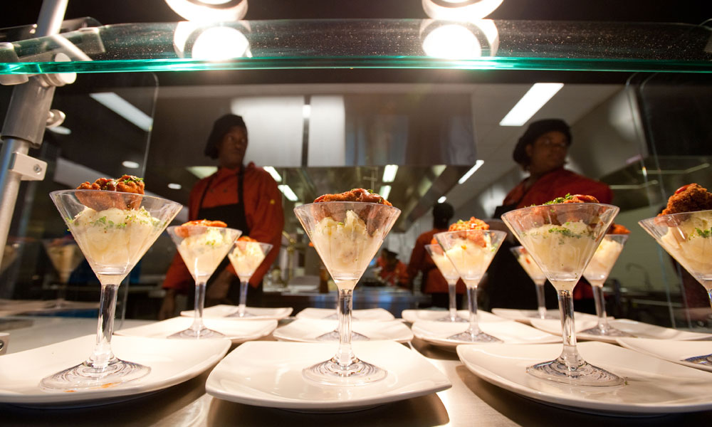 Feature image lots of plates holding martini glasses containing mashed potatoes