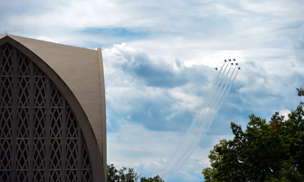 Feature image Air Force jets flying in close formation in the blue skies over the Interfaith Chapen