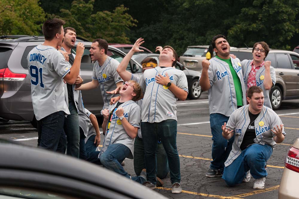 a cappella group performs in matching baseball jerseys