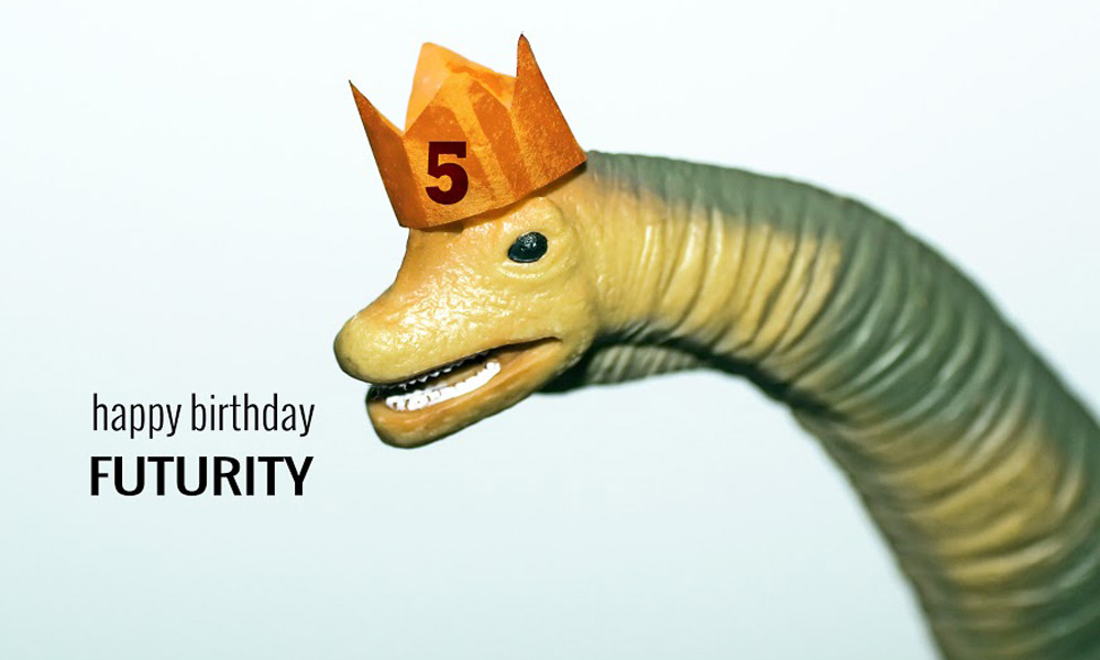 Feature image plastic dinosaur wearing a birthday hat with the text Happy Birthday Futurity