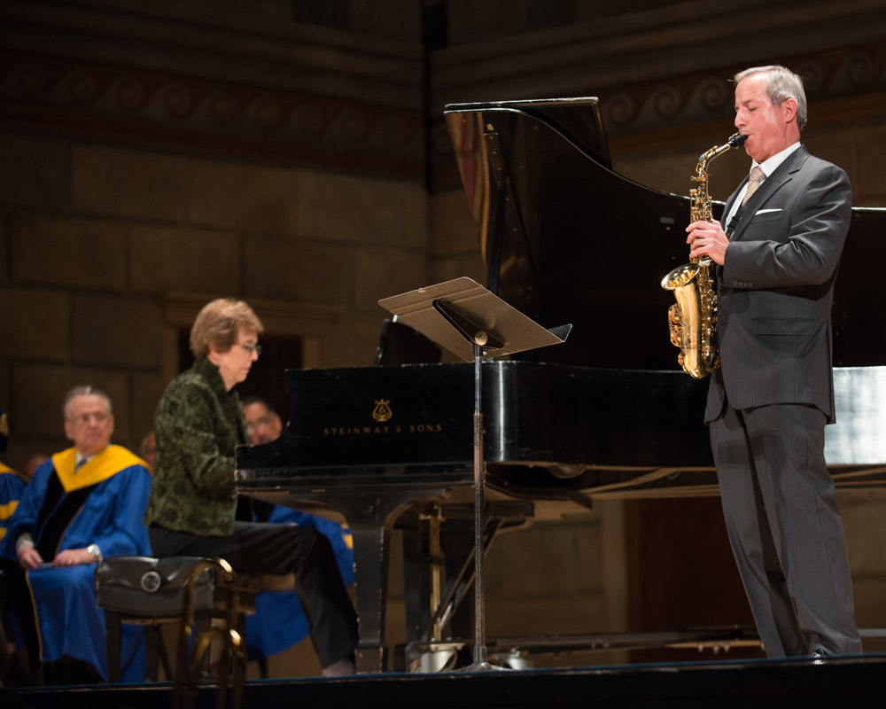 rossi playing saxophone