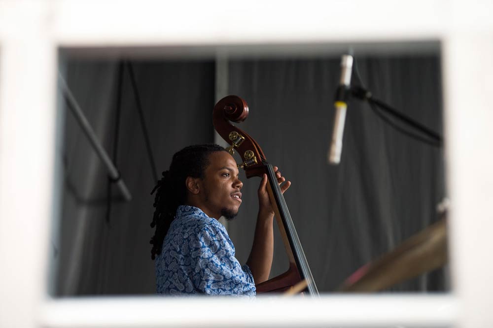 musician playing a stand-up bass