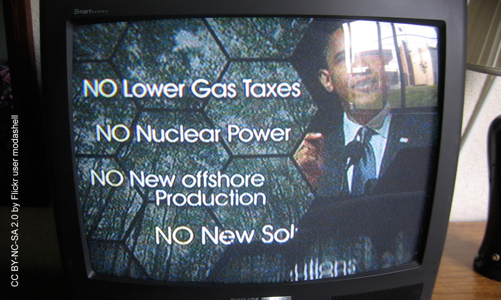 Feature image photo of a television showing a political ad with am image of Barack Obama