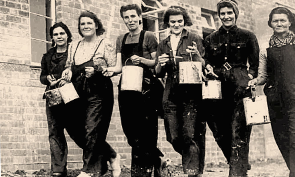 Feature image historic photo of women outside a factory during World War II
