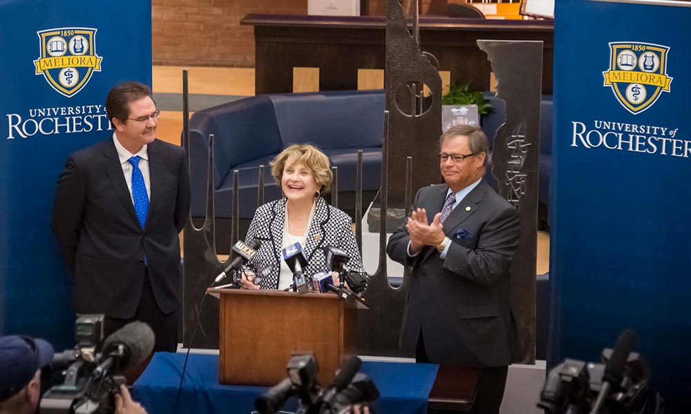 Feature image Rob Clark, Louise Slaughter and Robert McCrory at a press conference