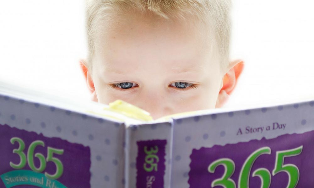 child reading a book
