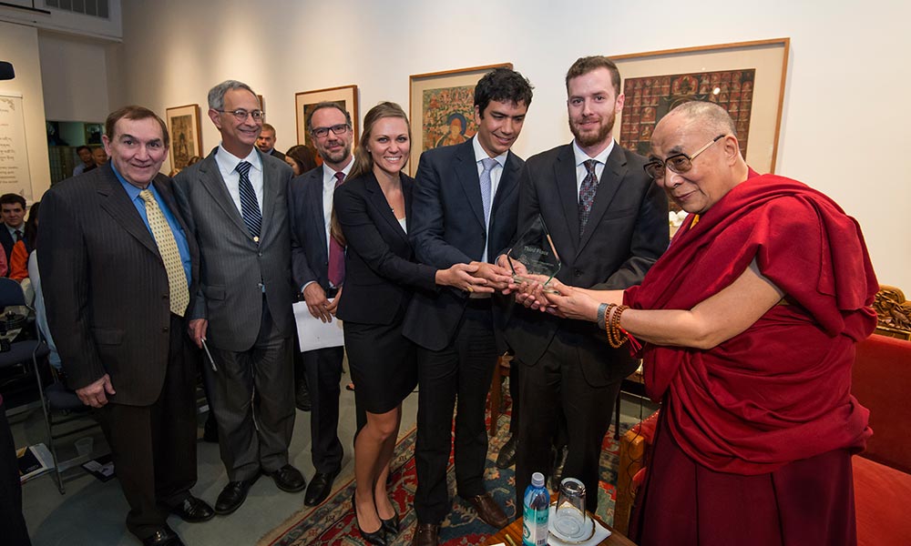 Feature image students and administrators pose with Dalia Lama after winning an award