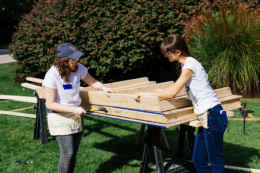 Taryn Anatruda ’16 and Victoria Seremtis ’19 helped build a shed for Habitat Humanity over the course of the day. The shed will be given to a Rochester family that needs storage space.