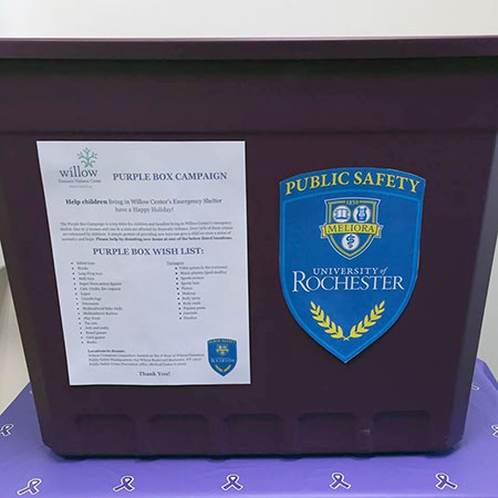 purple bin with signage