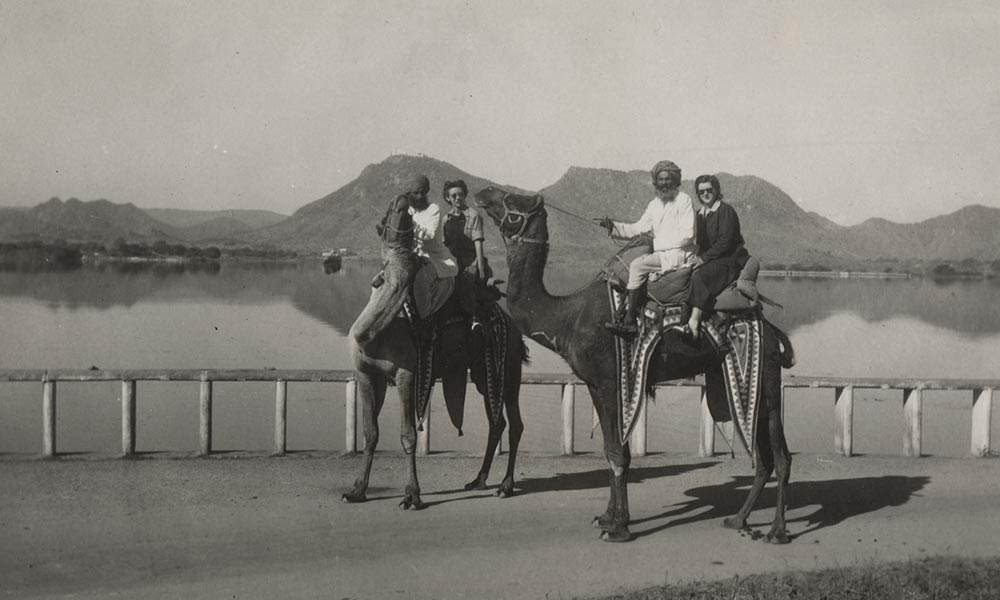 historical photo of people on camels