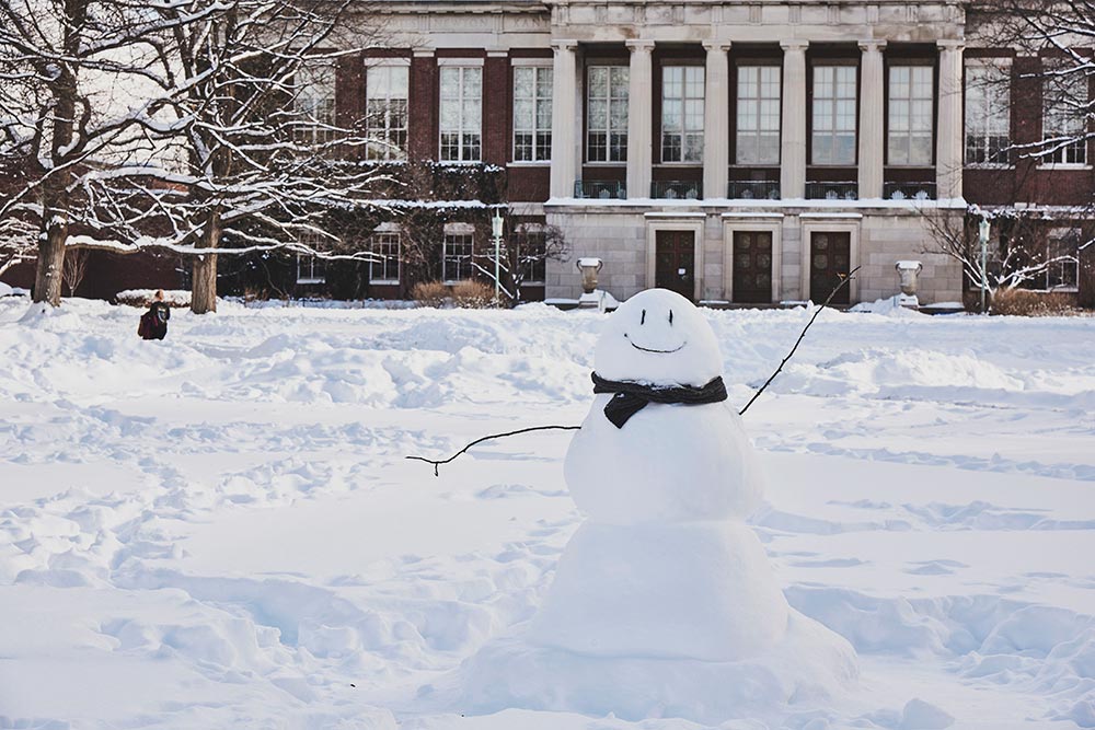 Feature image smiling snowman on the quad