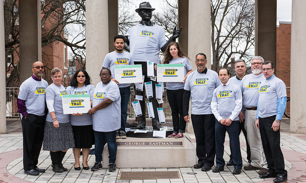 Feature image faculty and staff wear shirts reading We're Better Than That