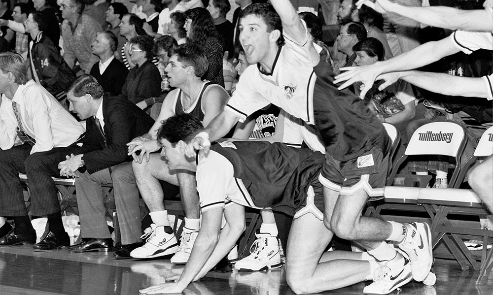 Feature image historical photo of basketball players celebrating