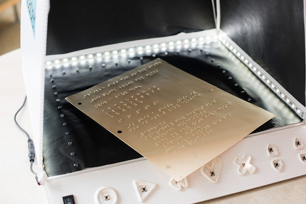 close-up of braille reader