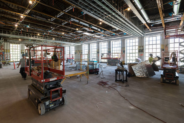 construction workers inside Frederick Douglass Building