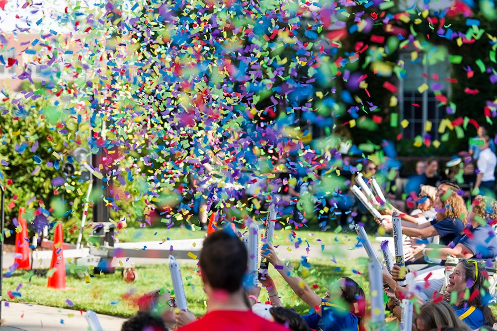 lots of colorful confetti flying through the air