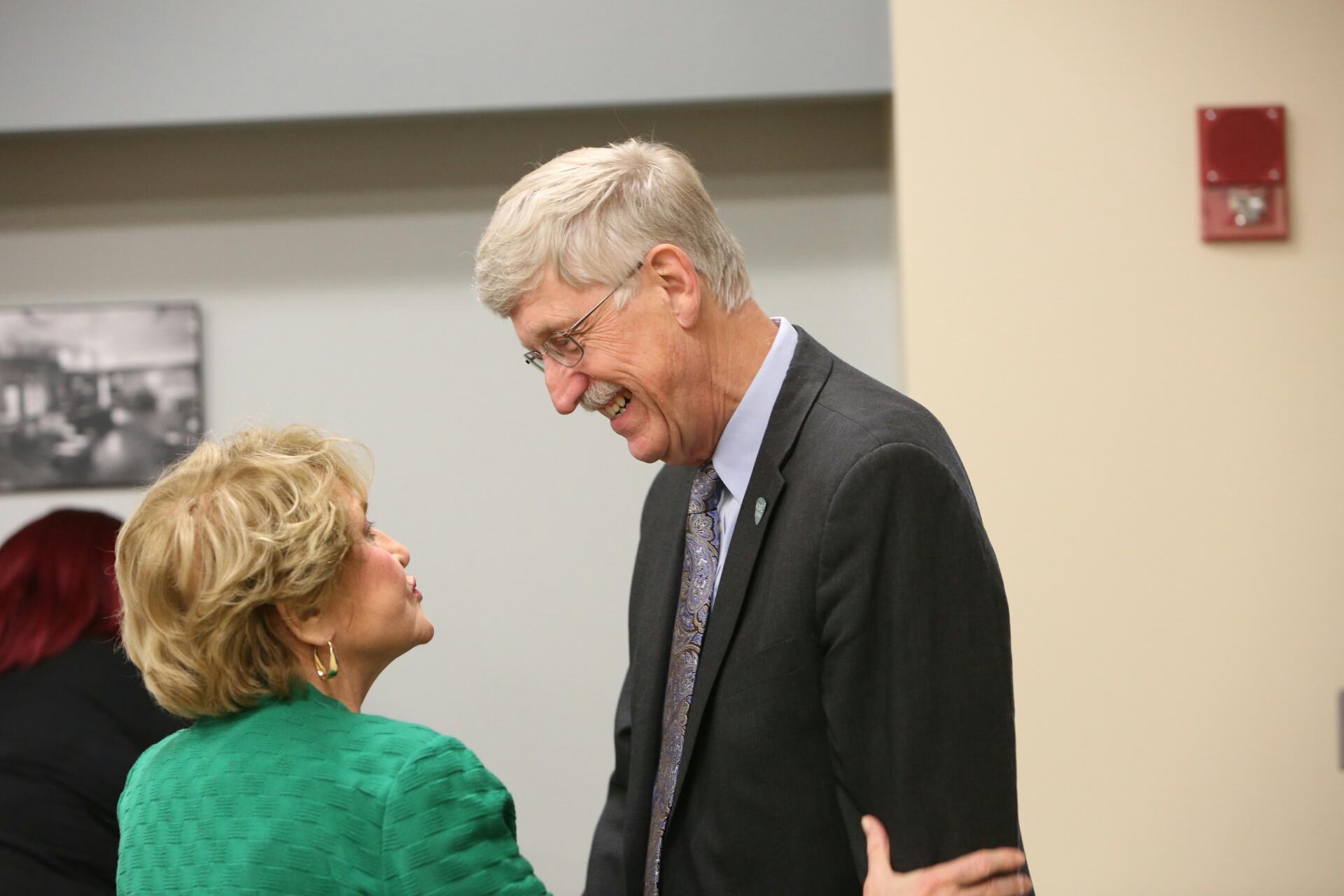 NIH director Francis Collins talks with U.S. Congresswoman Louise Slaughter.