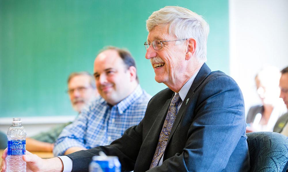 Feature image Francis Collins at a conference room table