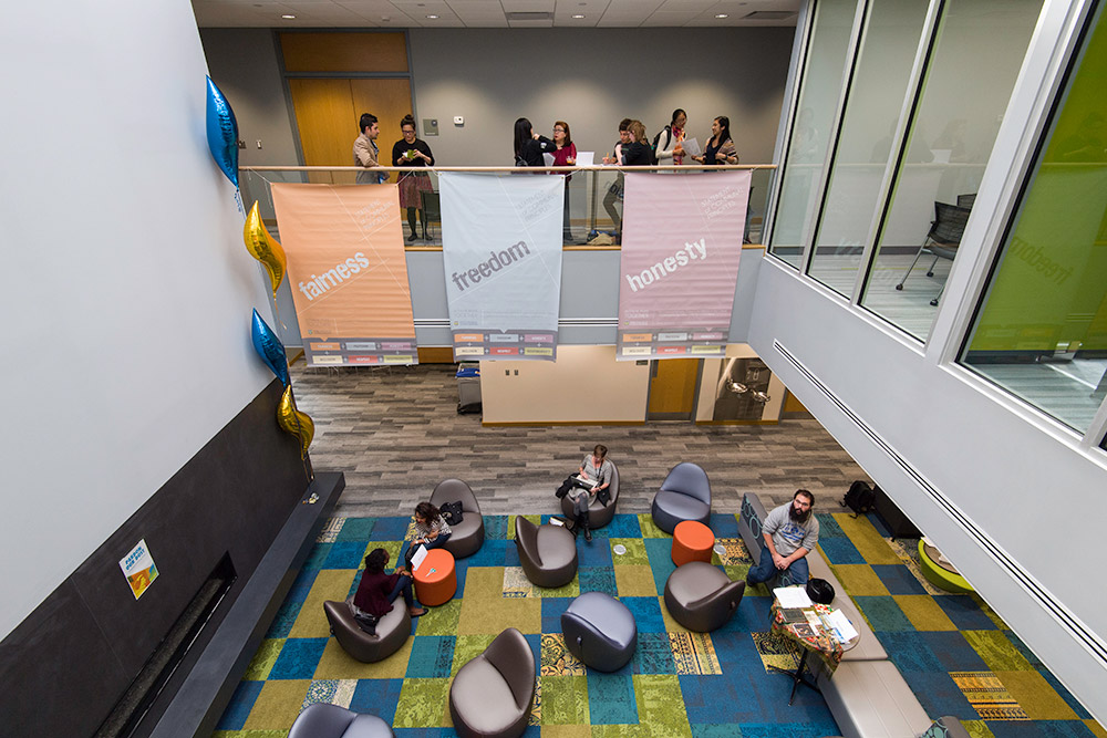 overhead photo of students gathering in the Language Center