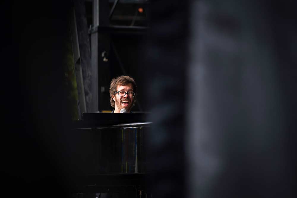 Ben Folds behind the piano