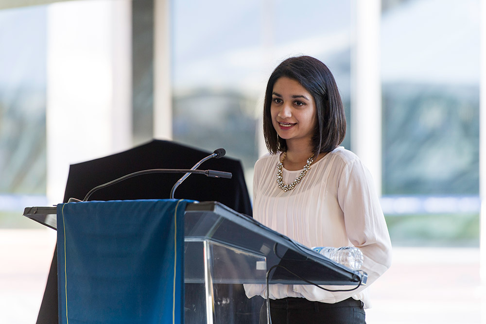 student speaks at podium