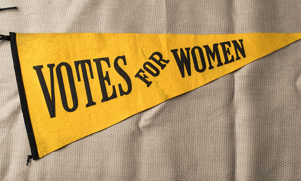 Feature image Pennant reads VOTES FOR WOMEN