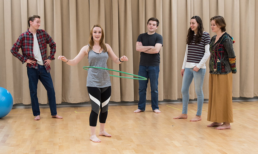 Feature image cast of play on stage