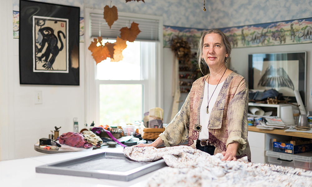 Feature image woman standing in her artist workshop
