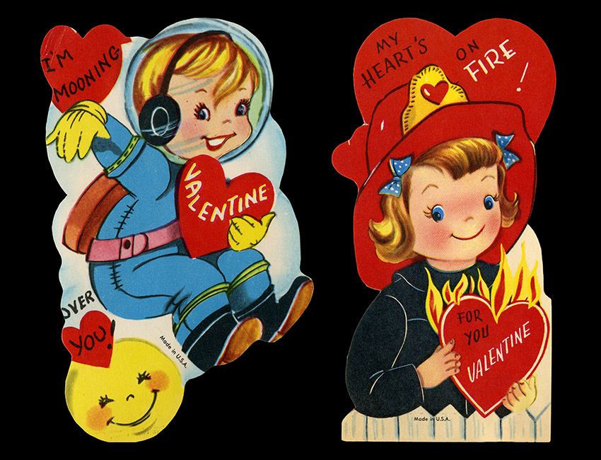 two Valentine cards, one reading "I'M MOONING OVER YOU, VALENTINE and the other reading MY HEART IS ON FIRE, VALENTINE