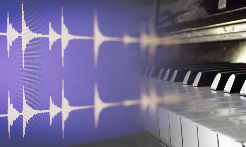 image of waveform against piano keyboard.