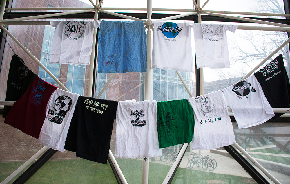 t-shirts hanging in front of Hirst Lounge windows