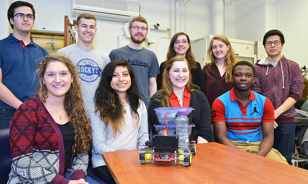Feature image students and their chemically-powered table-top vehicle