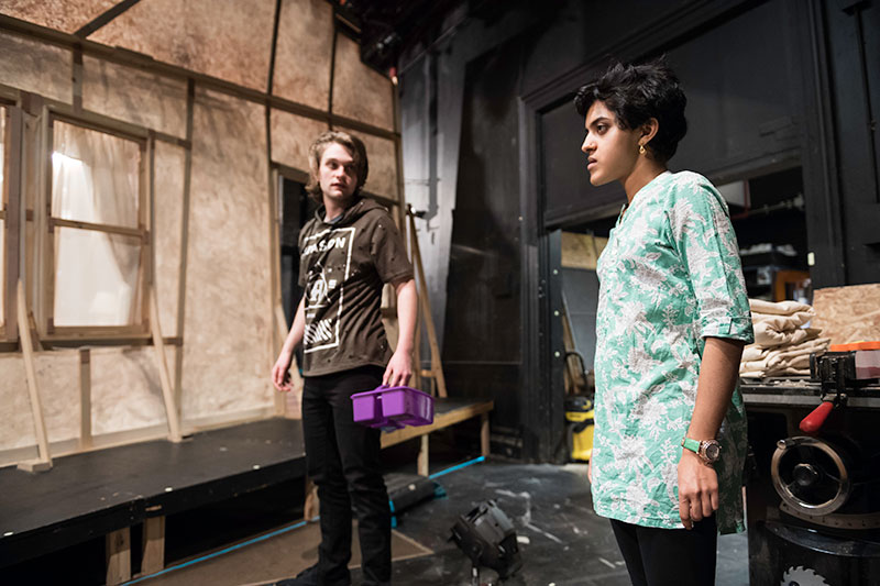actor and director speaking backstage