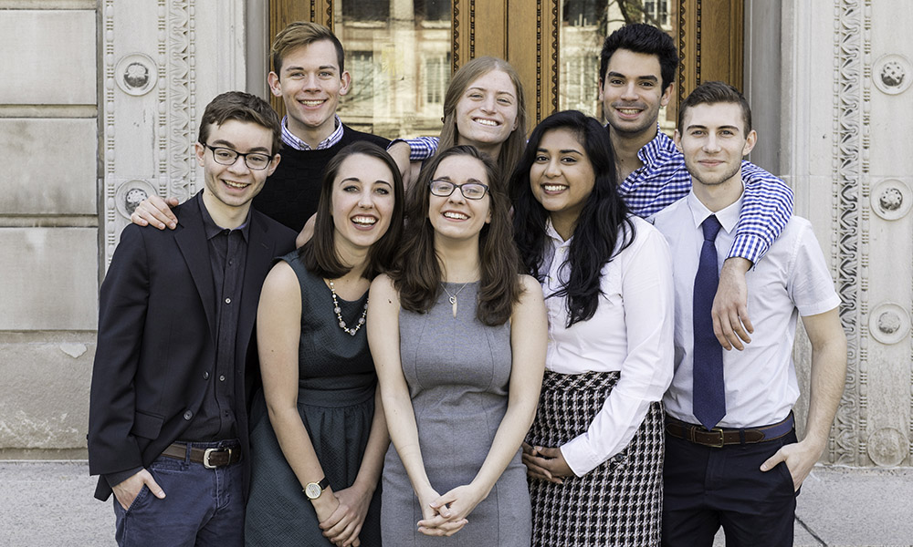 group portrait of students on steps of library
