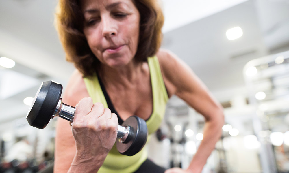 woman lifting weights