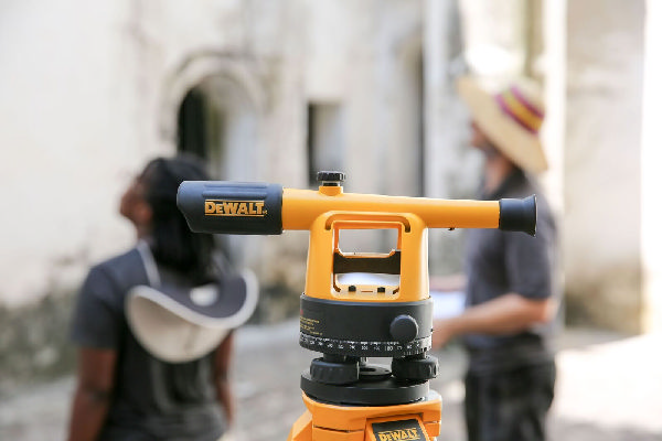 tool in foreground, people in background