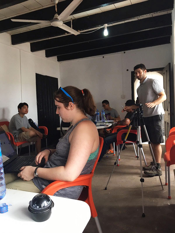 people sitting in a room