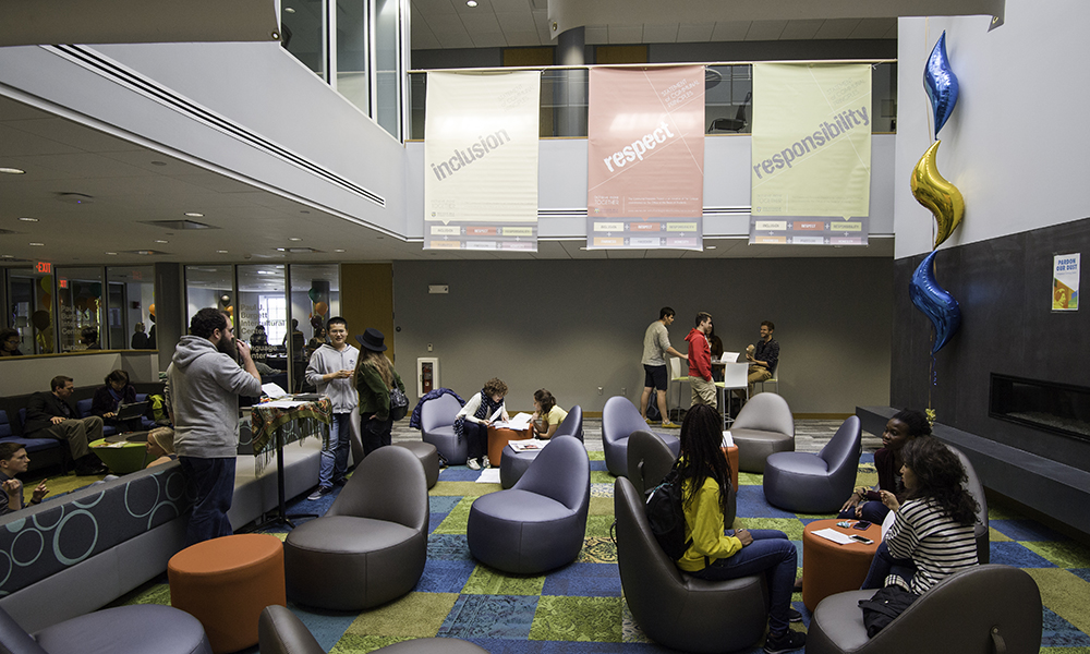 Feature image flags hangin against a wall read INCLUSION, RESPECT, RESPONSIBILITY