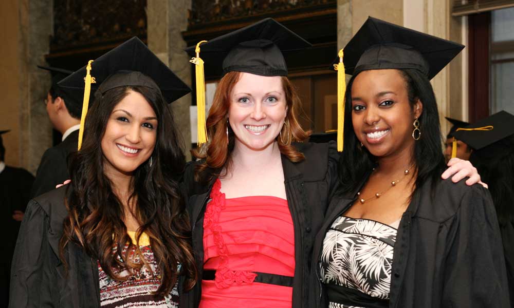 Feature image Three female Simon Business School graduates