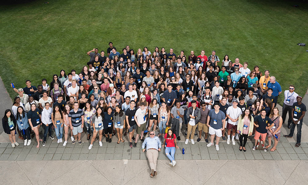 Feature image students standing on Eastman quad