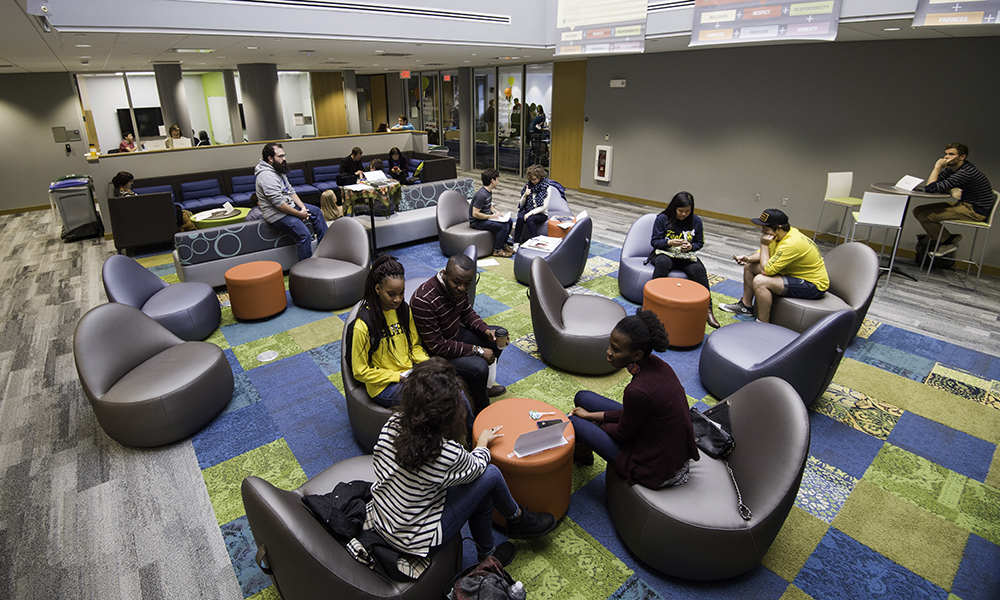 Feature image group of students sitting in Language Center