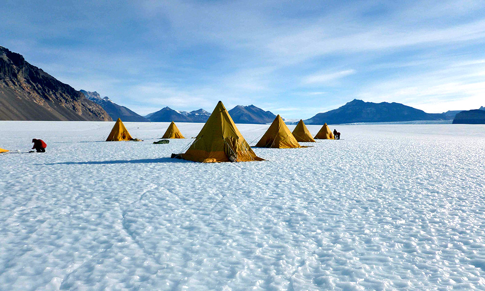 Feature image tents on an icy landscape