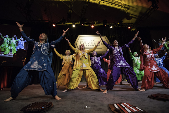 Feature image UR Bhangra group performing on stage