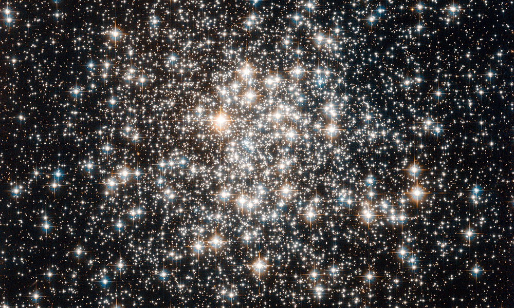 group of stars against a dark sky