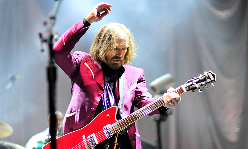Feature image Tom Petty playing guitar