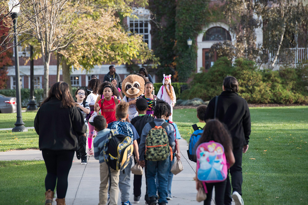 large group of students in a variety of costumes