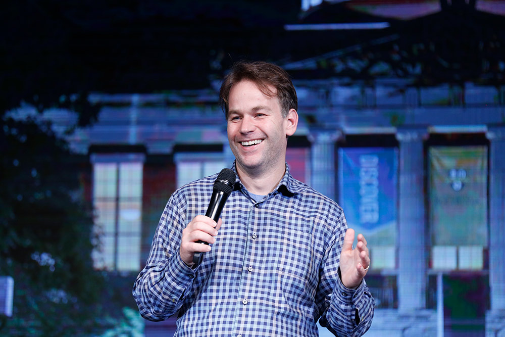 comedian laughing on stage