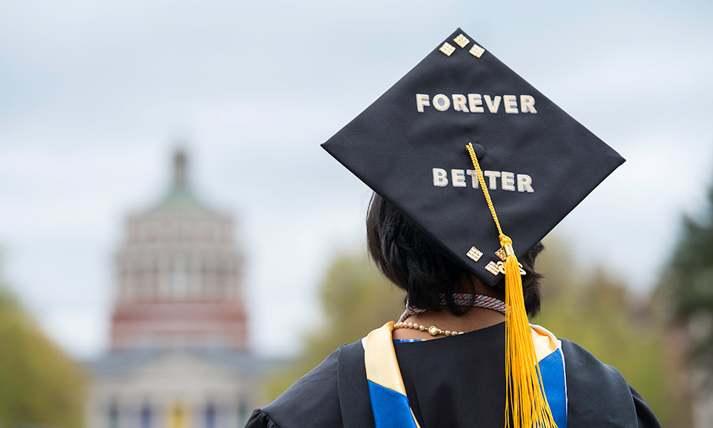 graduation cap reads FOREVER BETTER