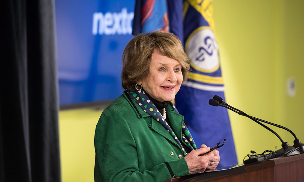Louise Slaughter behind the podium