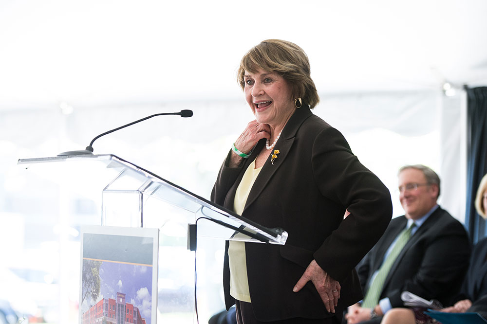 Louise Slaughter laughing at podium